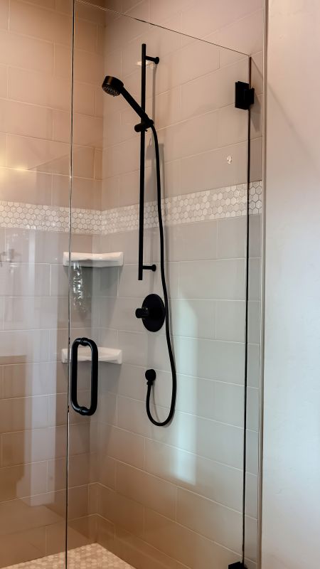 Walk-in Shower with Black Frame Accents